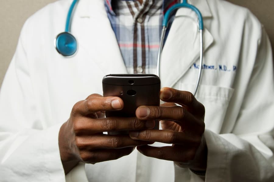 Health data and systems being worked on a laptop
